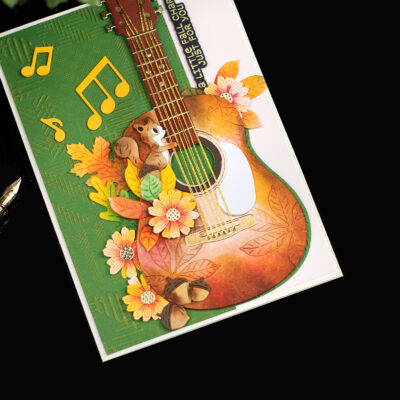 Little Squirrel Playing the Spellbinders Majestic Guitar